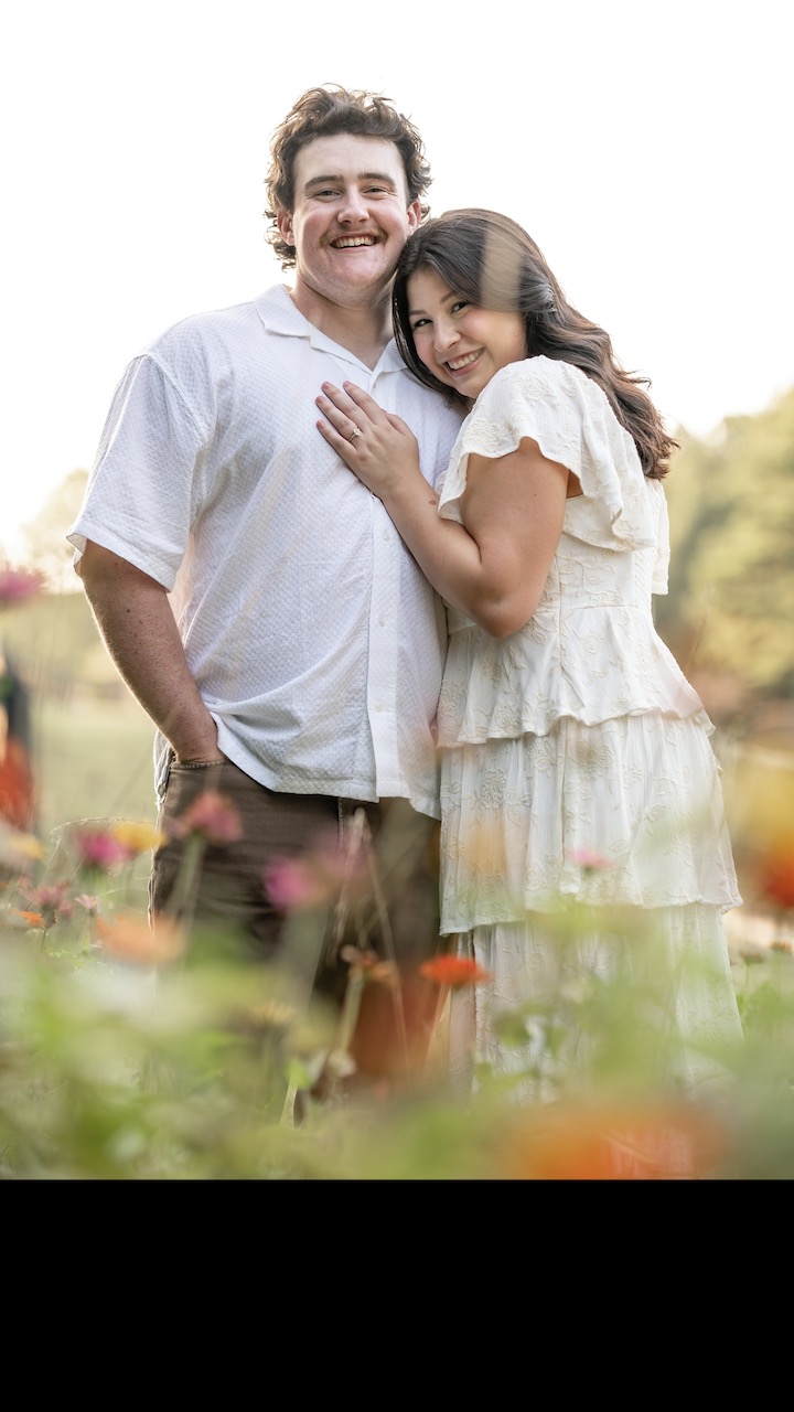 Photograph of a beautiful couple getting engaged